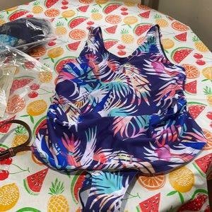 Size 20 women’s bathing suit never worn.  1 piece
